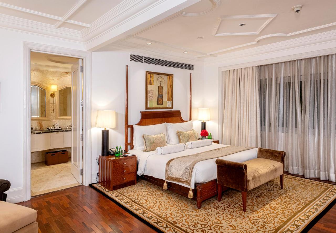 Hotel The Claridges Nowe Delhi Zewnętrze zdjęcie A bedroom at the Taj Mahal Palace