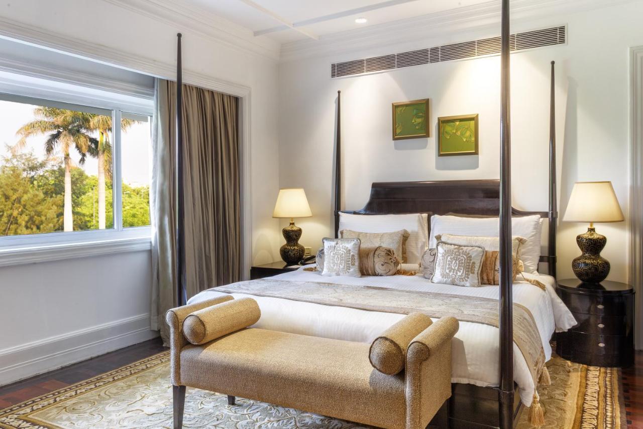 Hotel The Claridges Nowe Delhi Zewnętrze zdjęcie A bedroom at the Taj Mahal Palace