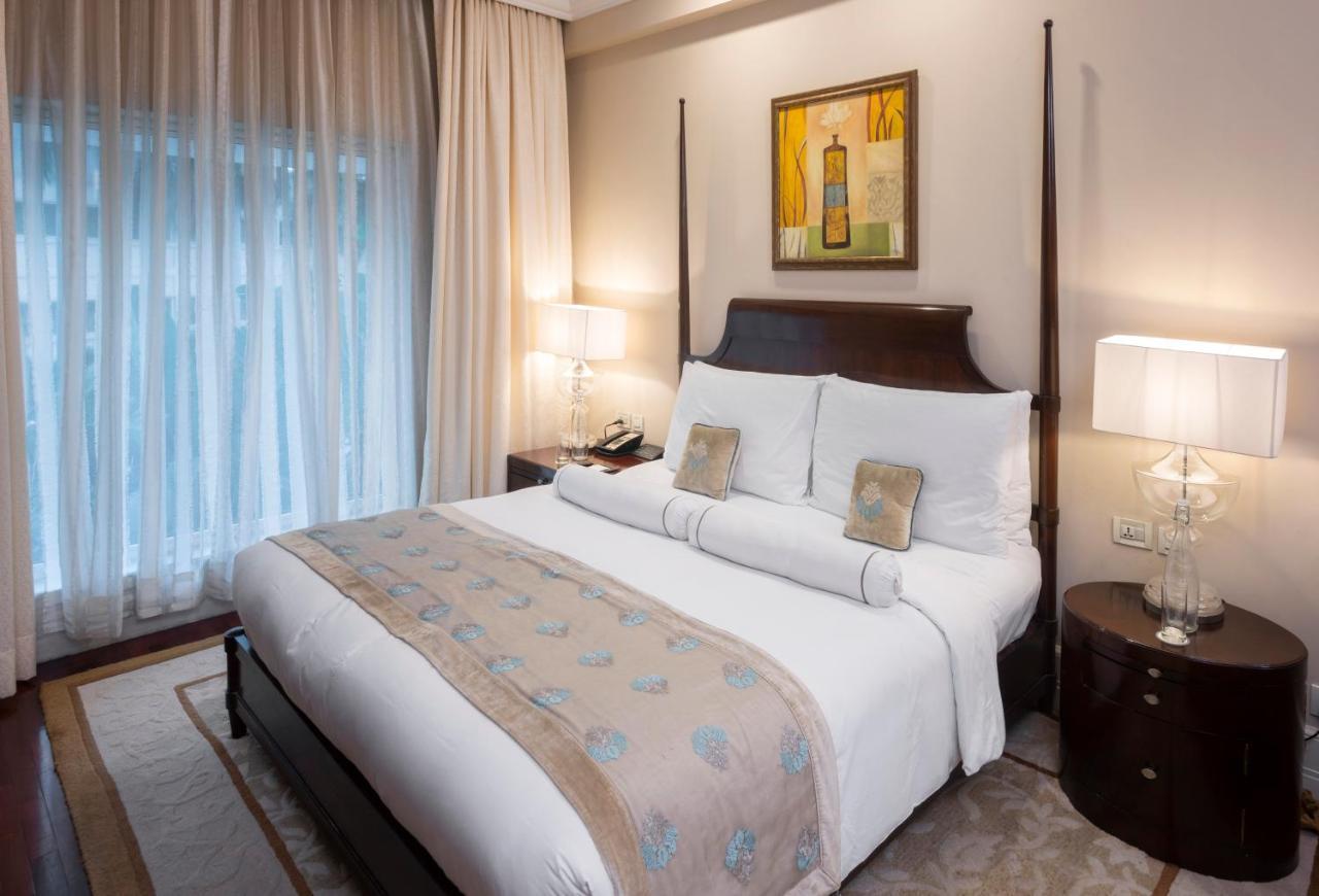 Hotel The Claridges Nowe Delhi Zewnętrze zdjęcie A bedroom at the Taj Bengal